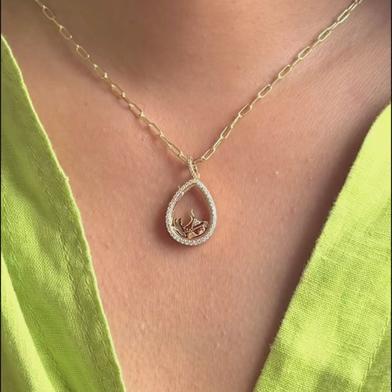 Diamond pear shape glass locket charm lifestyle shot displaying wearable elegance