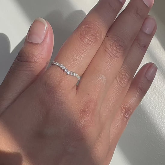 Closeup of Diamond Chevron Band Ring showing chevron pattern and diamond placement