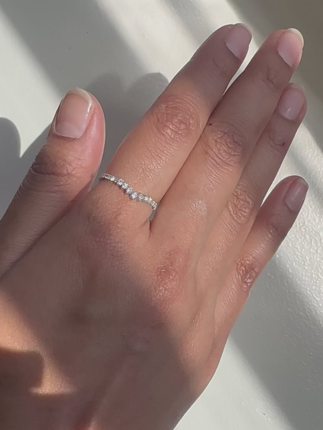 Closeup of Diamond Chevron Band Ring showing chevron pattern and diamond placement