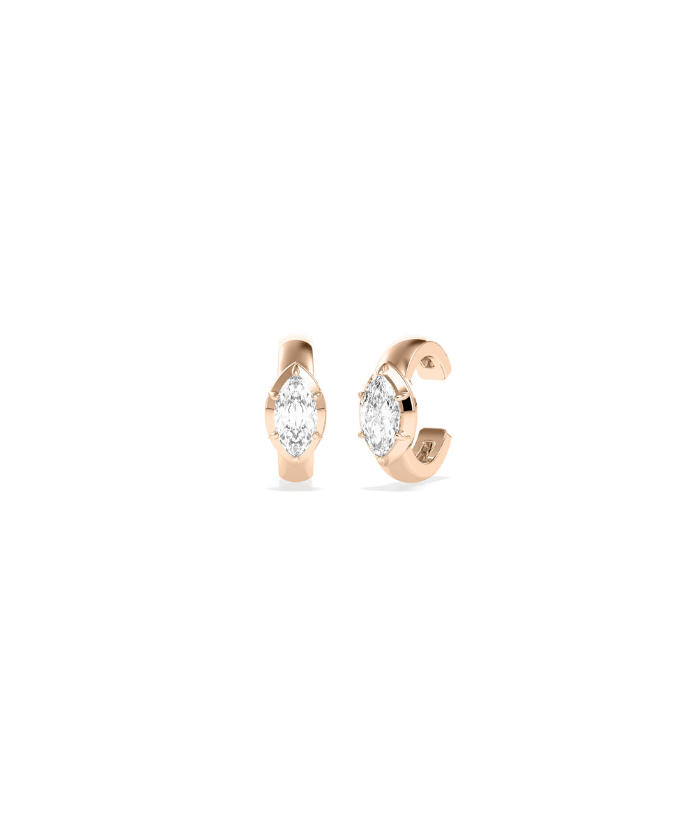 Rose gold ear cuffs featuring marquise-cut diamonds in a four-prong setting, no piercing required