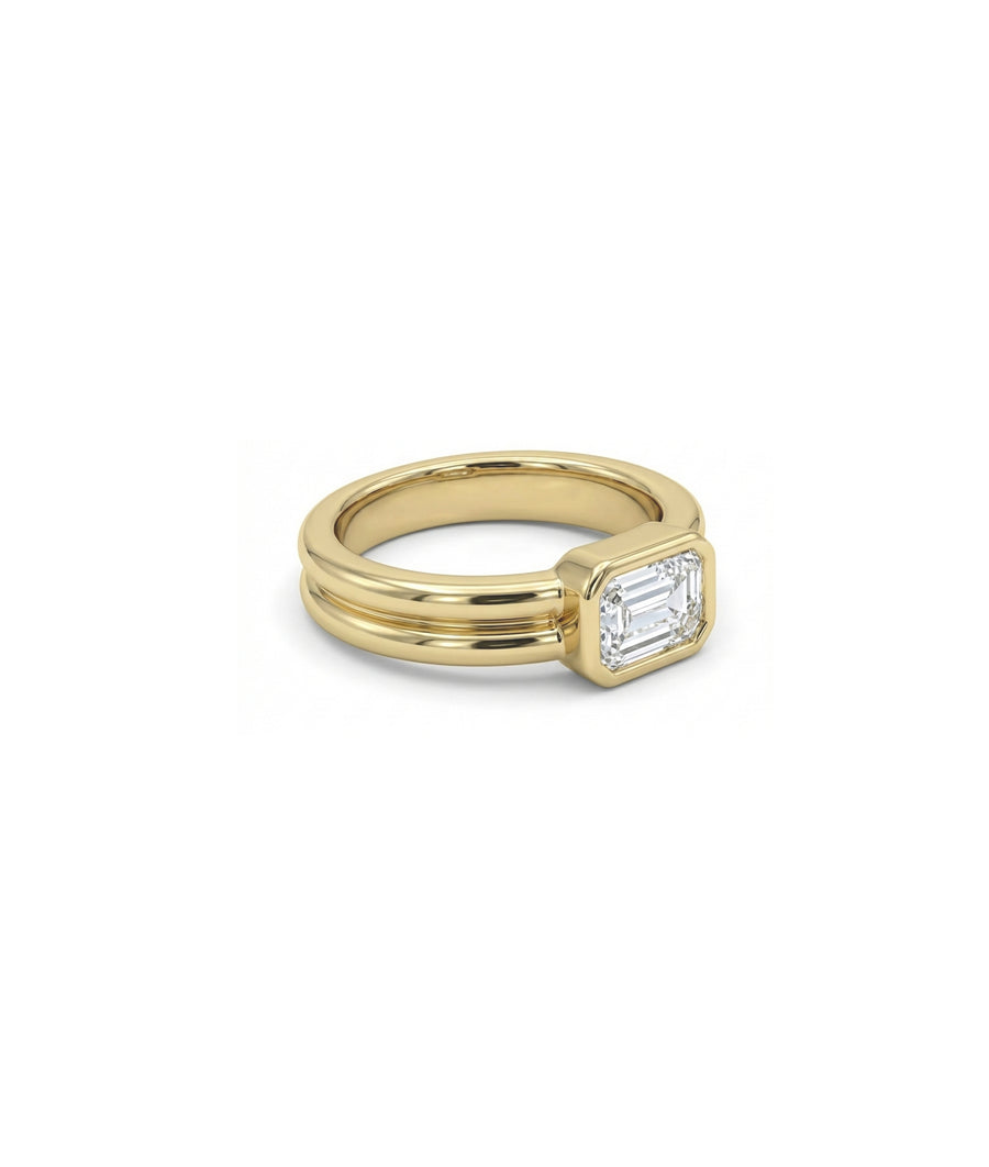 Solitaire bezel double band ring in 14K yellow gold side profile view