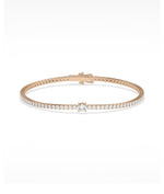 Solitaire center diamond tennis bracelet in 14K rose gold