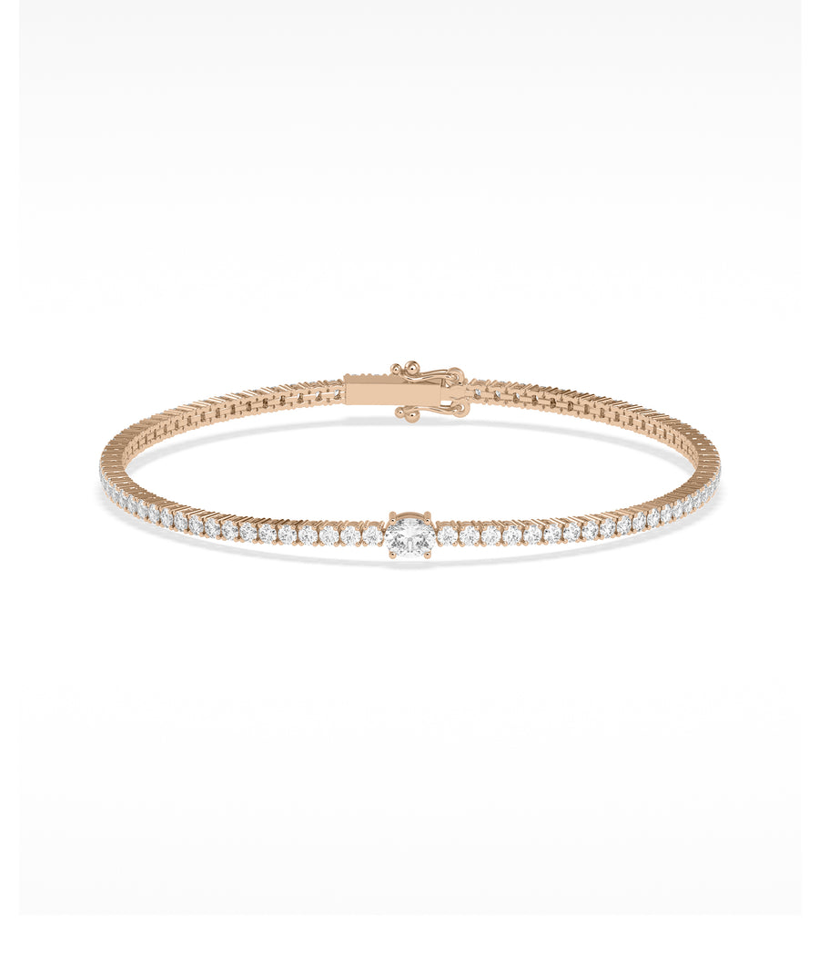 Solitaire center diamond tennis bracelet in 14K rose gold