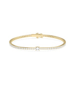 Solitaire center diamond tennis bracelet in 14K yellow gold
