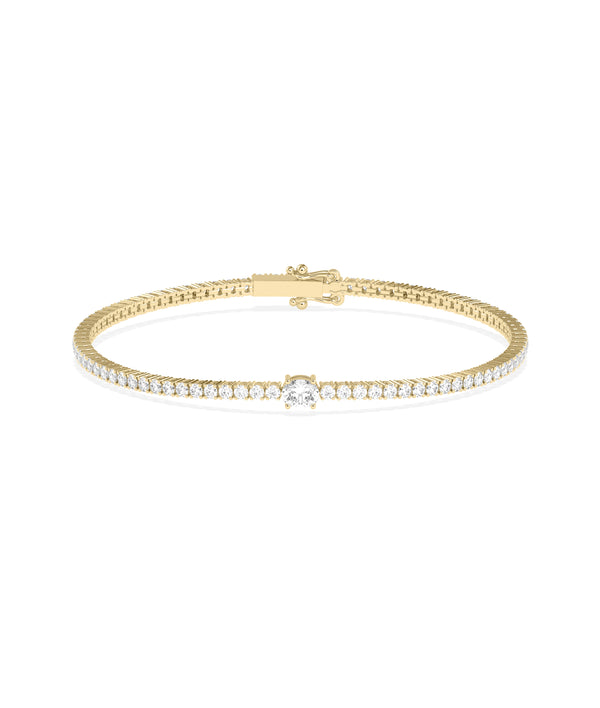 Solitaire center diamond tennis bracelet in 14K yellow gold