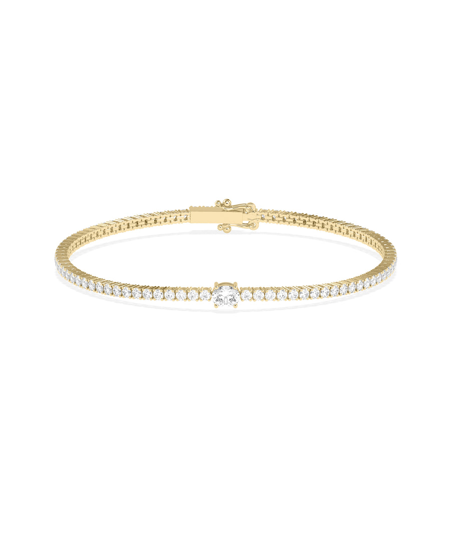Solitaire center diamond tennis bracelet in 14K yellow gold