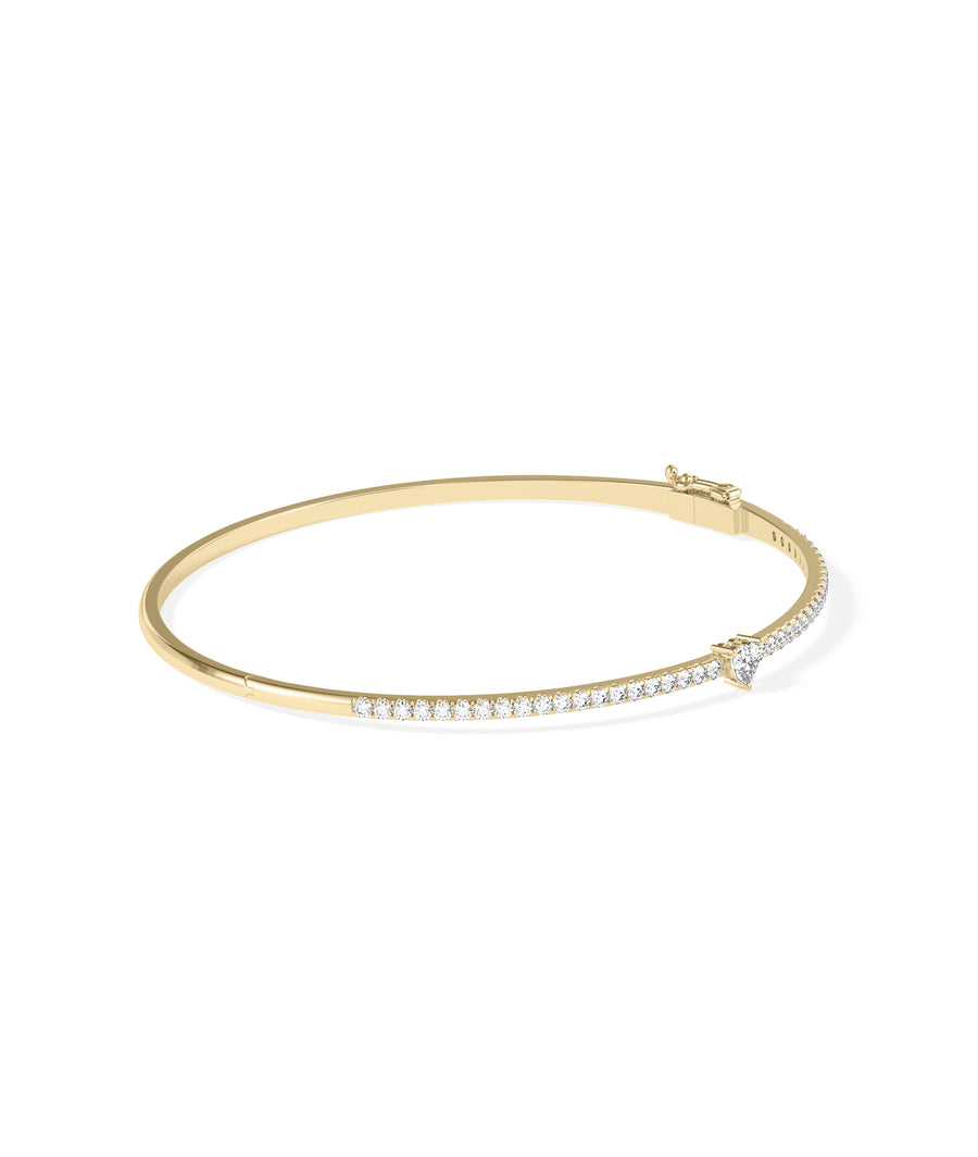 Straight line diamond bangle with solitaire in 14K yellow gold, side view