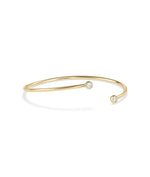 Two-stone bezel diamond flex bangle in 14K yellow gold, side view