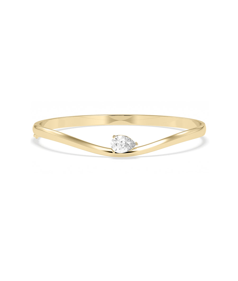 Wave solitaire diamond bangle in 14K solid yellow gold