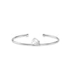 White gold open cuff bangle bracelet with a heart-shaped diamond cluster centerpiece
